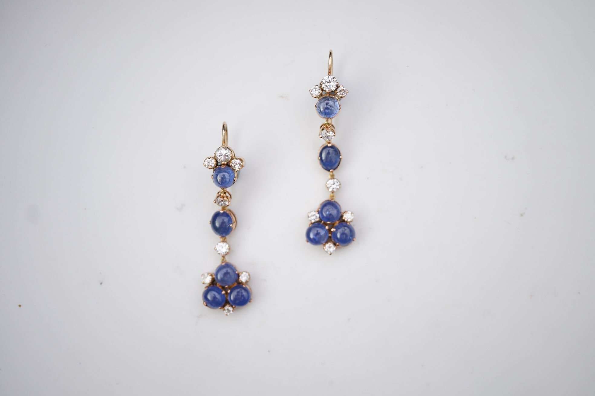 A pair of sapphire and diamond drop earrings